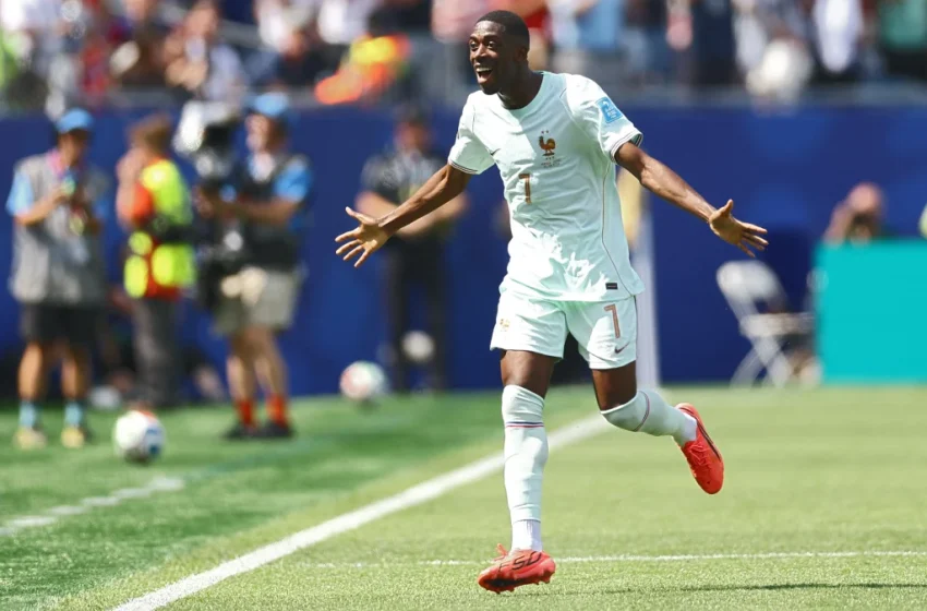  EUA classifica em primeiro lugar e hat-trick de Dembélé